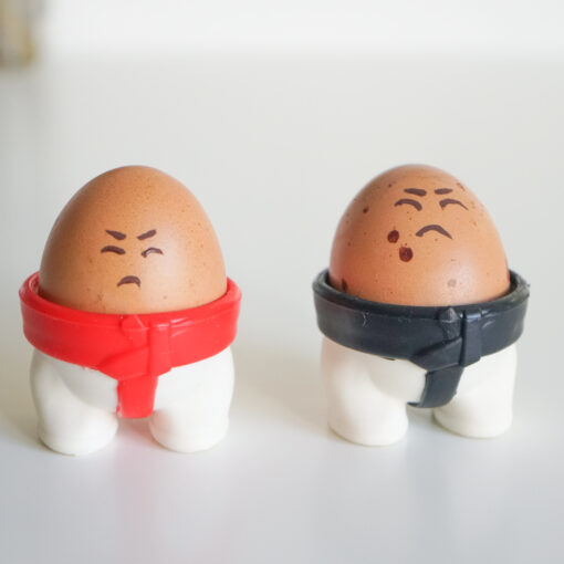 Set of Sumo ceramic egg cases